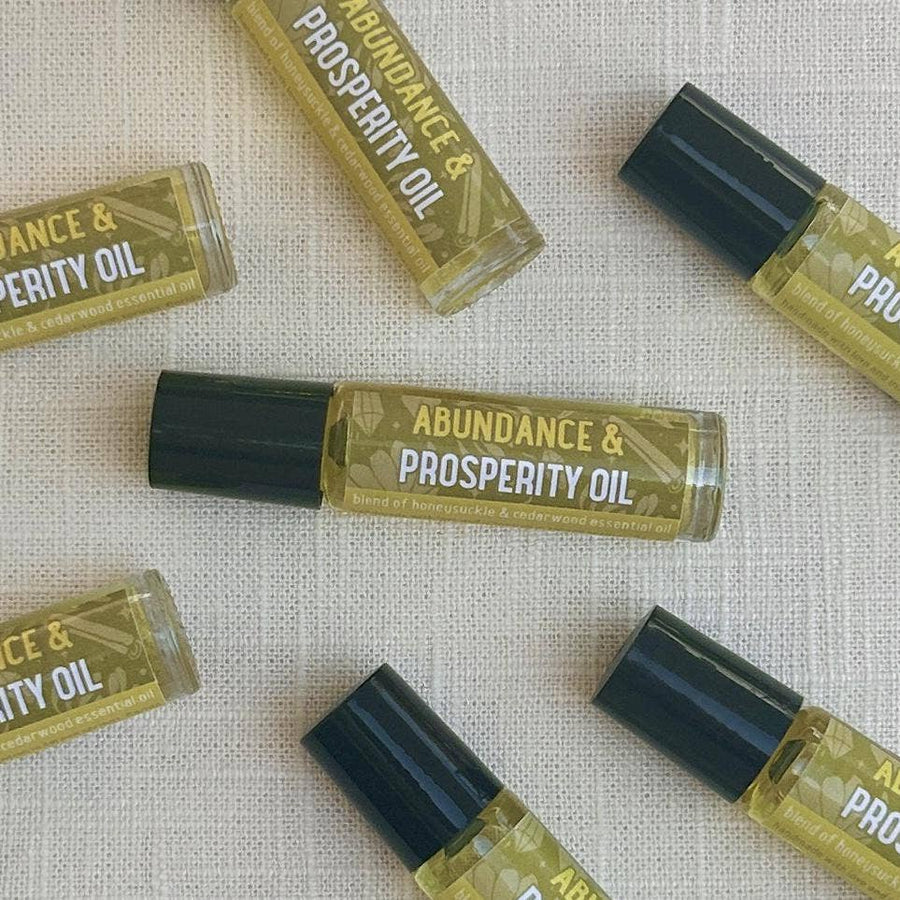 Attract abundance and calm with our cedarwood and honeysuckle roll-on—clean ingredients for rituals and mindful manifestation