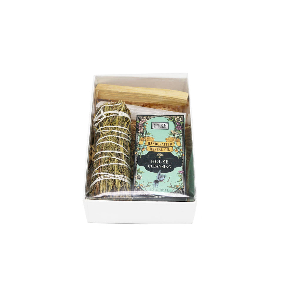 Cleanse and realign with our house cleansing kit—pine sage, herbal oil, selenite, and palo santo for clarity and balance.
