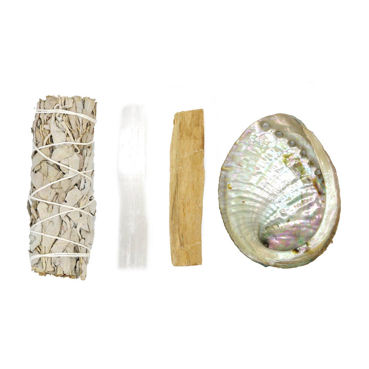 Cleanse and center with our mini smudge kit—white sage, selenite, palo santo, and abalone shell for rituals, and clearing.