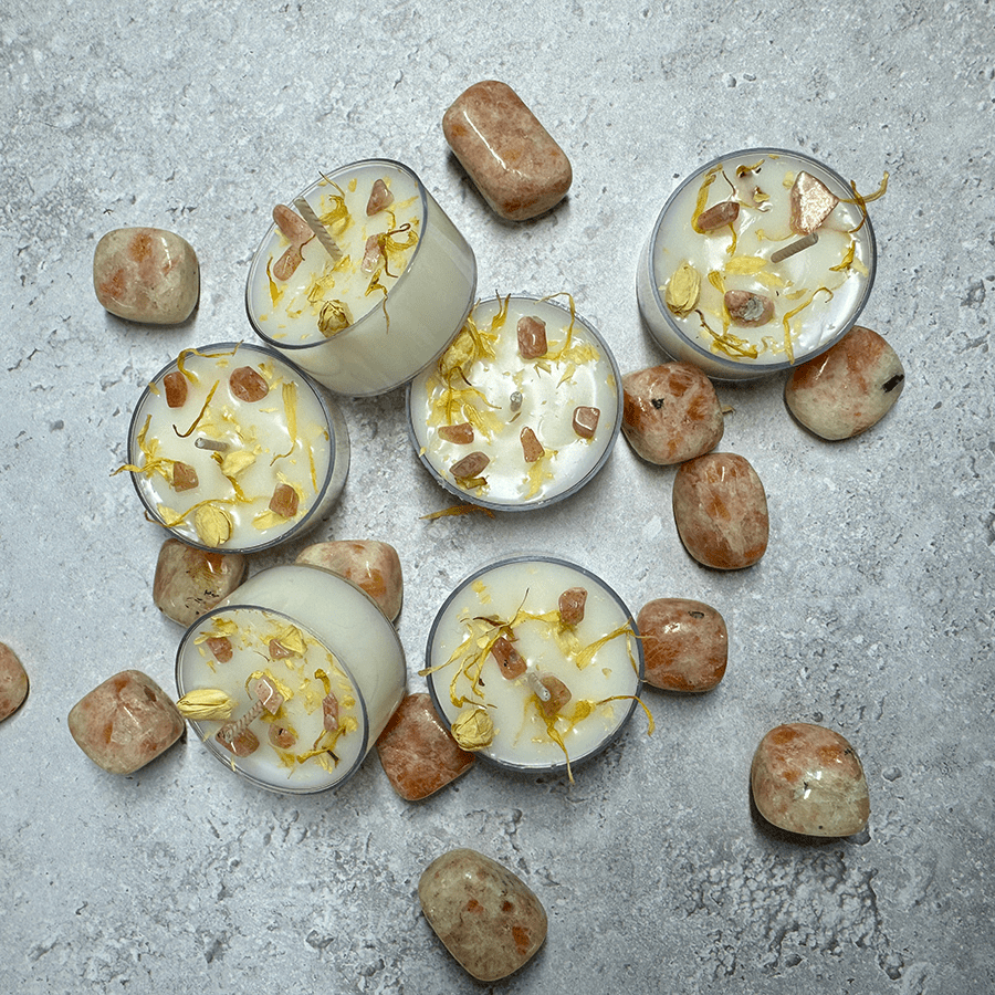 Celebrate midsummer with spell candles infused with honeysuckle, basil, and sunstone—ideal for rituals.