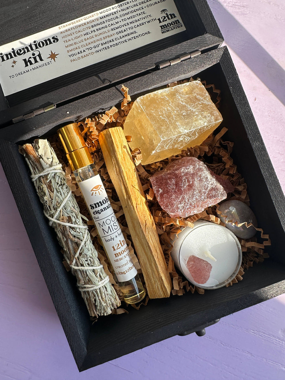 Reset and protect your energy with this crystal and smudge kit—sage, palo santo, spray, and stones for grounding and balance.