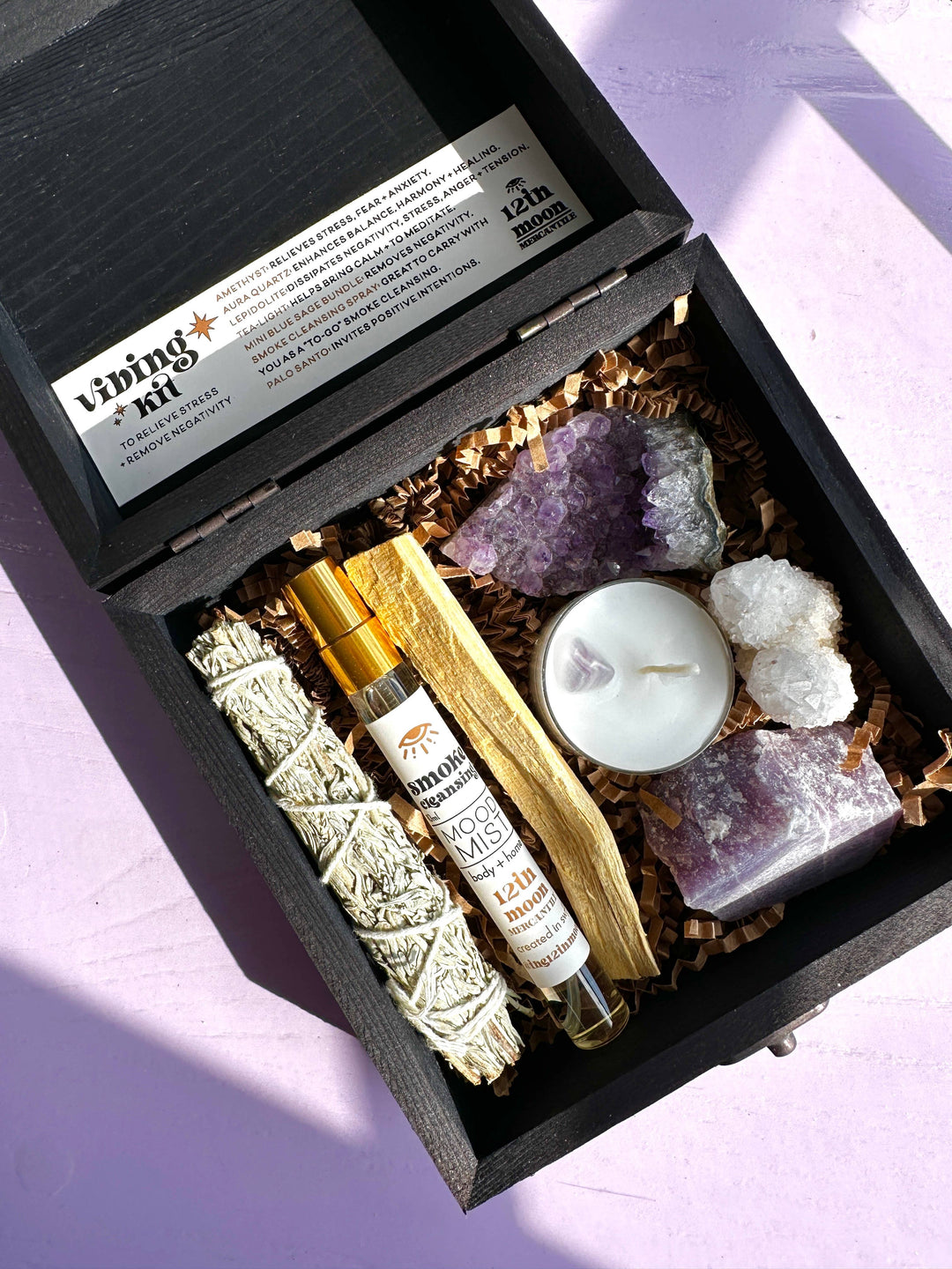 Reset and protect your energy with this crystal and smudge kit—sage, palo santo, spray, and stones for grounding and balance.